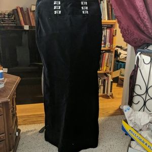 Full length black velvet skirt.